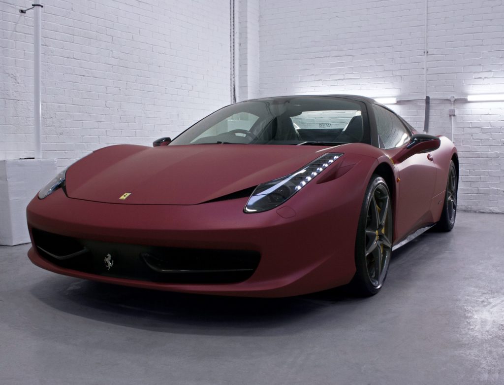 Partial Matte Black Vinyl Wrap on Red Ferrari 458 Italia