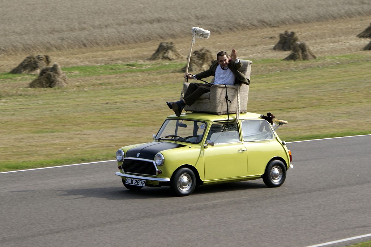 Rowan Atkinson rides atop of Mr Bean's car. Photograph by Nathan Wong.