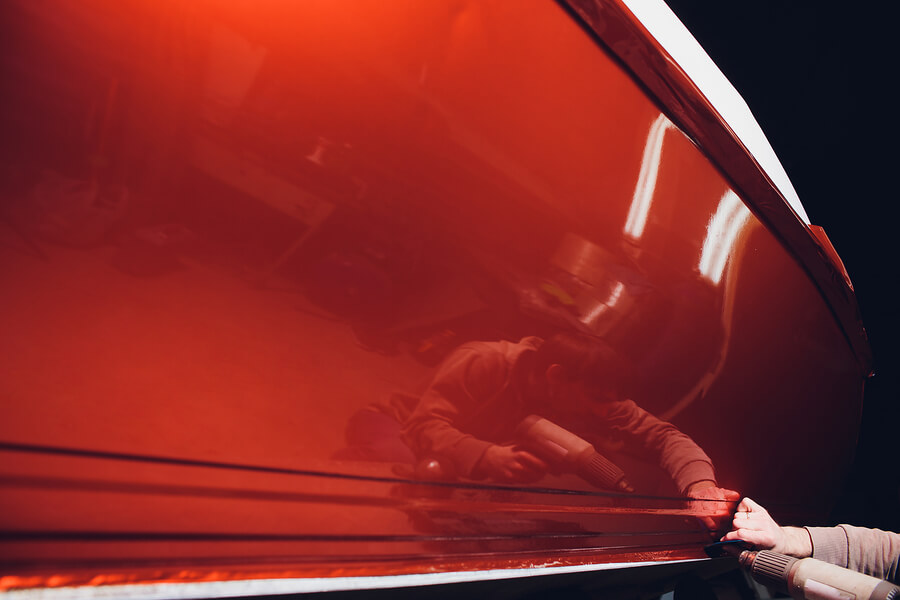 A beautiful speedboat undergoing wrapping.