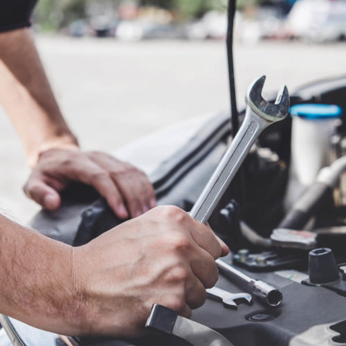 A car engine undergoing modification.